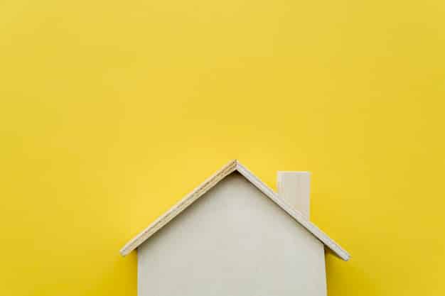 close up wooden miniature house model yellow background 23 2148038666 โฮมวัน เทค สินค้าวัสดุก่อสร้างครบวงจร ใส่ใจ ดูแลลูกค้า